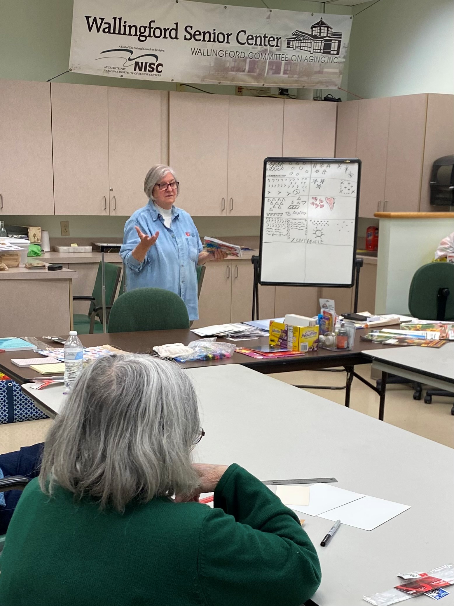 Diane Soares using her skills to teach others at the center.